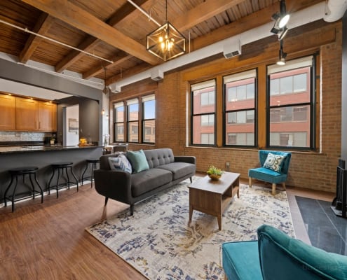 Living area in Chicago West Loop brick and timber loft rental
